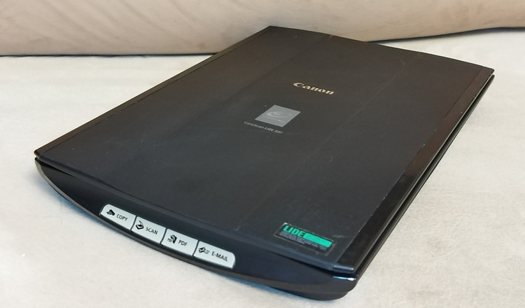 اسکنر فوقباریک Canon LiDE 100 با کیفیت ۲۴۰۰×۴۸۰۰ dpi استوک