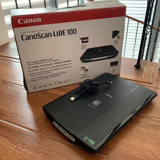اسکنر فوقباریک Canon LiDE 100 با کیفیت ۲۴۰۰×۴۸۰۰ dpi استوک