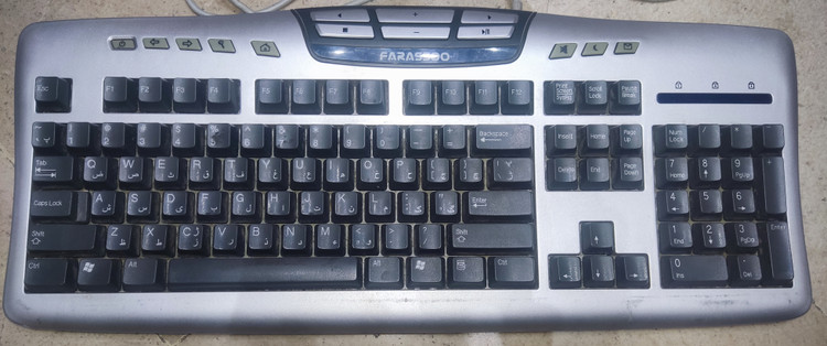کیبورد سیمی PS2 فراسو مدل FCR-6620 با رنگ نقرهای، طراحی ارگونومیک
