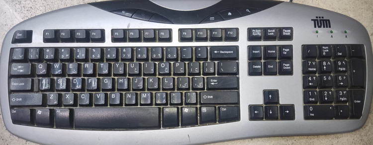 کیبورد سیمی نقرهای مدل KB-0402 با اتصال PS2 استوک
