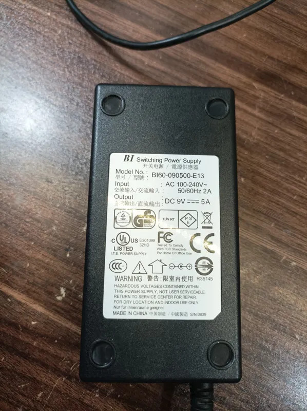 آداپتور تجهیزات الکترونیکی BI BI60-090500-E13 خروجی 9V 5A توان 45 وات استوک