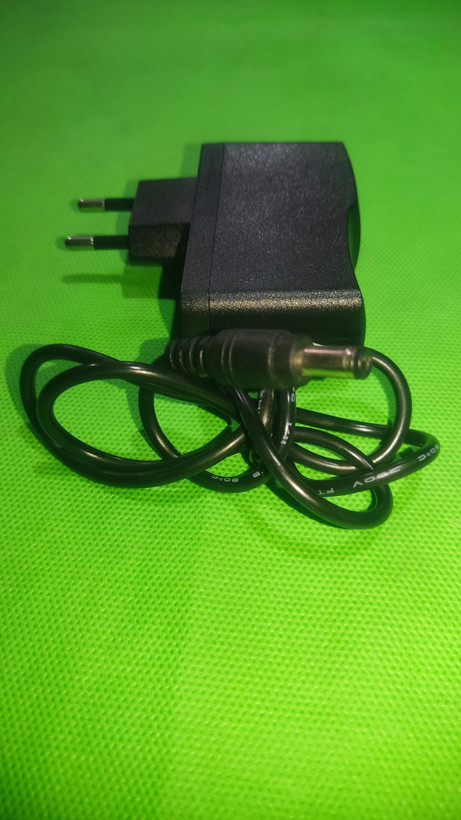 آداپتور AC/DC مدل GSSY-1210 12V 1A مناسب مودم و دوربین مداربسته | ضمانت فنی فروشگاه آران پی سی